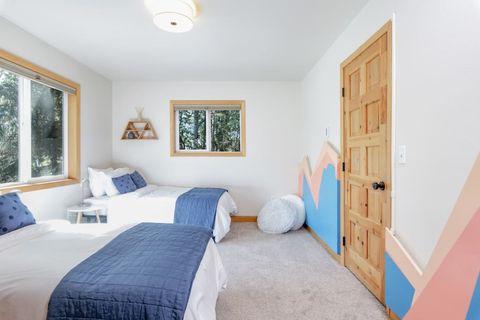 Bedroom with two twin beds. Upstairs.