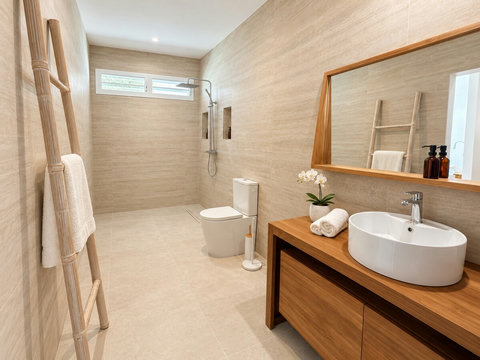 Orore — salle d’eau avec vasque, grand miroir, douche et toilettes.
