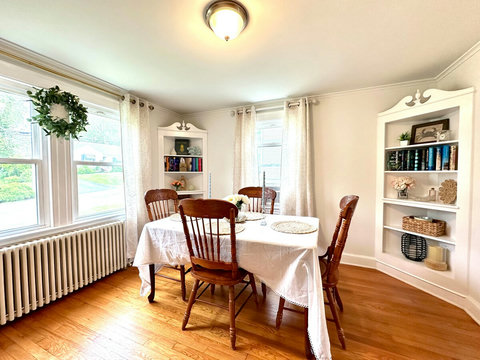 Charming built-ins are filled with books & games to enjoy. 