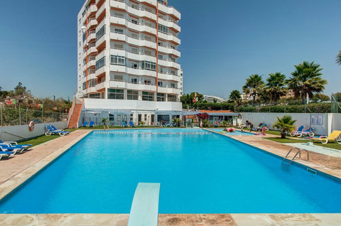 2 swimming pools which belong to the condo