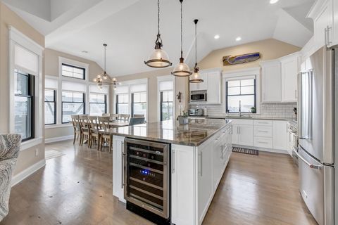 open concept kitchen - toaster oven, microwave, beverage refrigerator, coffee maker, nutri-bullet, blender, air fryer, and all utensils, dishes, mugs, glasses, etc. , including lobster crackers.    