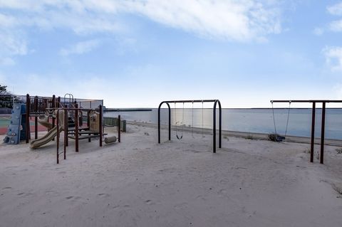 Play on the bay! Tennis courts, basketball hoop, playground and bay access around the corner.