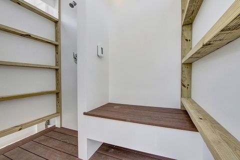 inside of the outdoor shower w/ changing area