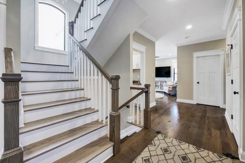 On the first floor, you will find 4 bedrooms, and a family room, with access to another deck 
