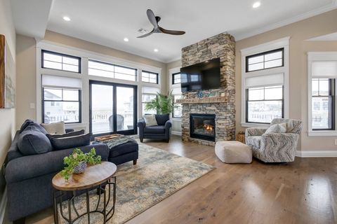 Reverse living opens up to the living room with ocean views.
