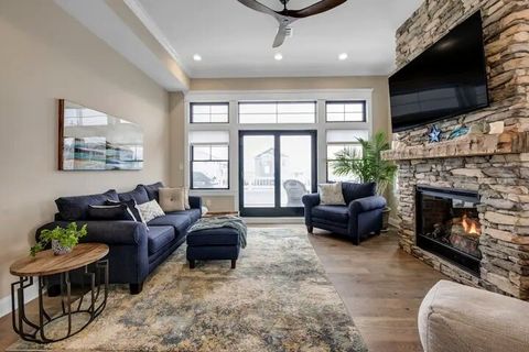 living room with entrance to front top deck 