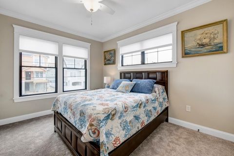 Queen bedroom #3 with entrance to side deck.