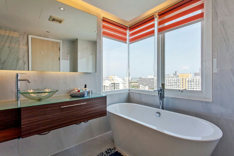 Master bathroom with the bath tube and all city view