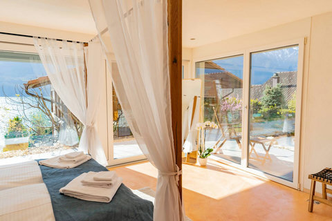 Romantic Four-Poster Suite.  Fall asleep in luxury with sheer drapery and wake up to the stunning Lake Brienz panorama. The ultimate romantic getaway with private terrace access.
