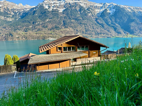 Your Private Swiss Chalet Destination! Experience authentic architecture and breathtaking Lake Brienz frontage. Set against the majestic Swiss Alps, this is the exclusive home base for your next adventure.