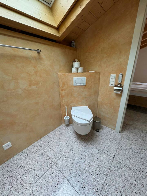 High-Tech Washroom Comfort. Features a premium automatic toilet (Japanese style) for the ultimate hygienic experience. Just one of the unexpected luxuries we provide!
