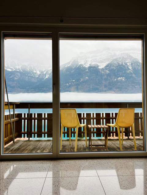 All-Season Comfort.  Enjoy full, unobstructed views of the Swiss Alps and the mesmerizing cloud inversion over Lake Brienz—even in winter! Our chalet is perfectly heated, offering a cozy retreat with balcony access for fresh Alpine air.