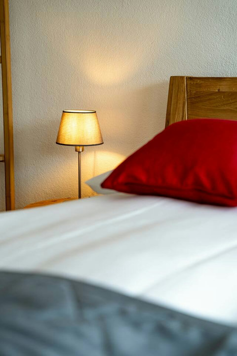 Cozy Ambiance.  High-quality linens, comfortable pillows, and soft bedside lighting create the perfect atmosphere for a restful night. Every detail is crafted for your peaceful, premium stay.
