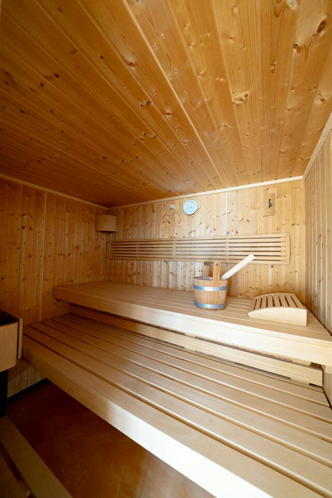 Your Private Finnish Sauna. ‍♀️ Enjoy exclusive access to this authentic, wood-paneled sauna for ultimate detoxification and relaxation. A luxurious, private spa amenity included in your Swiss Dream Living experience.