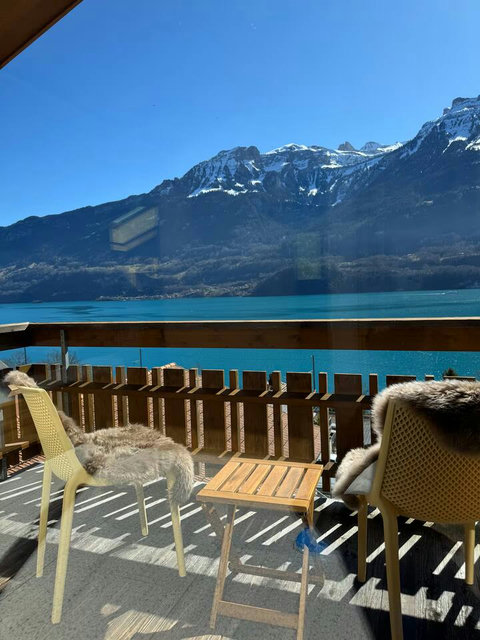 Unbeatable Balcony View. ️ Your private front-row seat to the breathtaking Swiss Alps and Lake Brienz. The perfect spot for wine and relaxation.