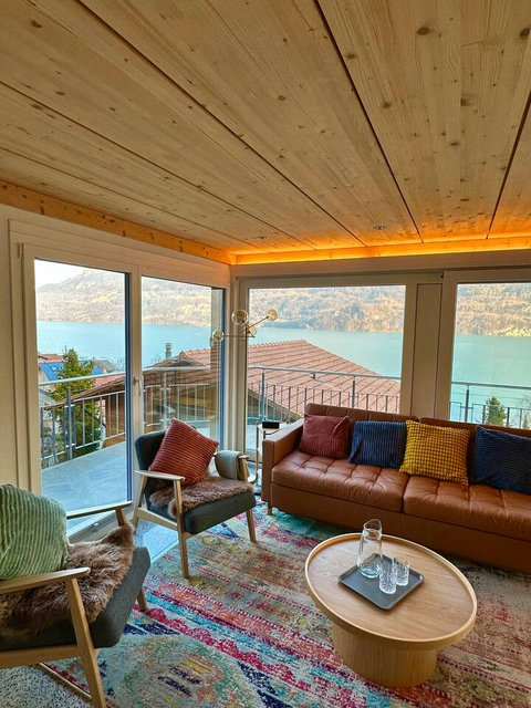 The Ultimate Gift: Unforgettable Views!  Treat your loved ones to this panoramic spectacle of Lake Brienz and the surrounding Alps. Experience the height of luxury comfort on our leather seating—a memorable Swiss Dream Living gift you can't wrap.