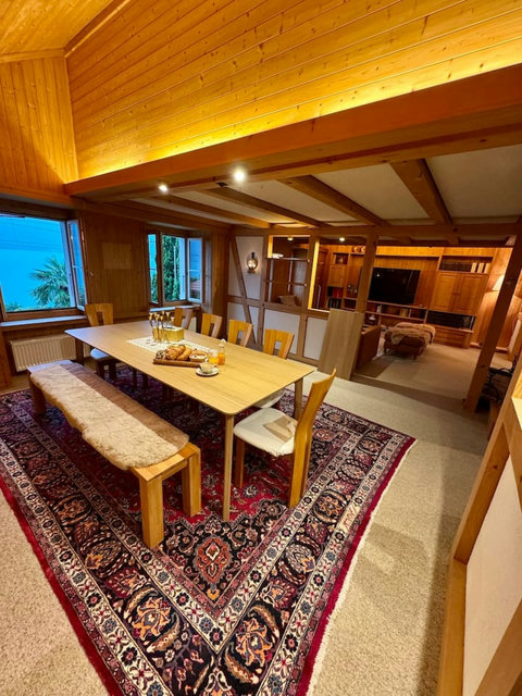 Dining together in a cozy chalet setting