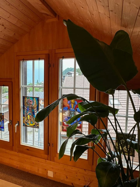 Charming window with colorful stained-glass details