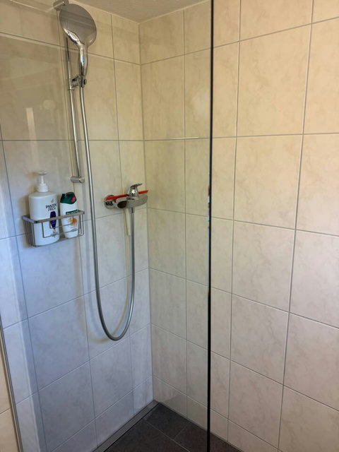 Immaculately maintained bathroom with fresh towels and hotel-style cleanliness