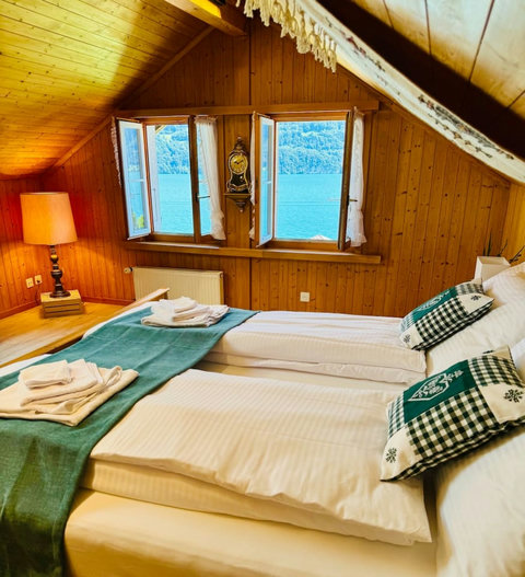Wake up to breathtaking lake views from the master bedroom