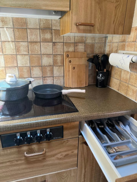 Find all the dishes and cookware you need conveniently stored and ready for use