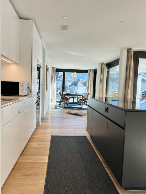 Bright, modern living with seamless indoor-outdoor flow—cook, dine, and relax in one airy, light-filled space.