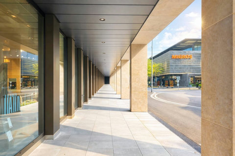 Cafés, restaurants, and shopping directly below the apartment—everything you need just steps from your door.