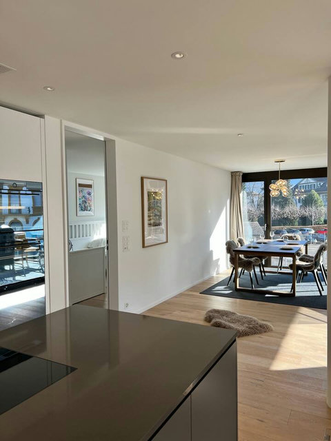 Bright open layout with smooth flow between rooms ✨ Thoughtfully designed space connecting kitchen, dining, and living areas—comfortable, airy, and ideal for relaxed Swiss holidays.