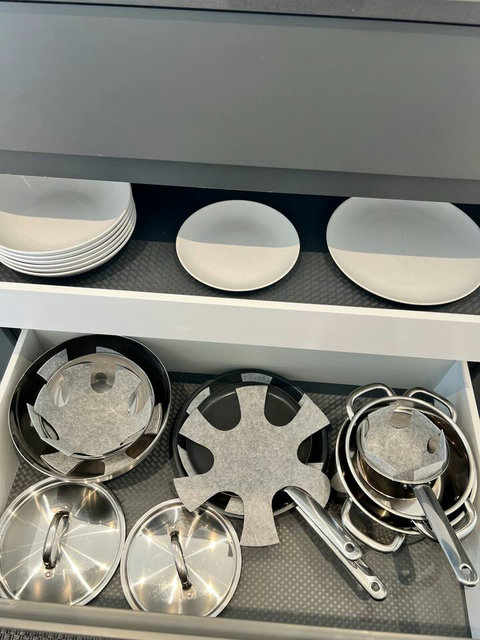 Fully stocked kitchen with quality tableware ️✨ Thoughtfully organized plates, bowls, and serving dishes make cooking and dining easy—perfect for relaxed meals at home during your Swiss getaway.