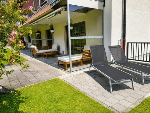 Manor 2 sunbeds at Chalet Swiss Dream Manor — unwind on the terrace with garden views, mountain air and a calm Swiss Alps atmosphere.