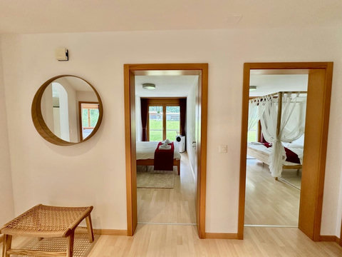 Manor 2 hallway — step-free access to bright bedrooms and living spaces, ideal for easy family stays in Meiringen.