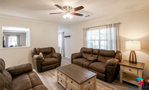 Living Room with reclining couches | Celling Fan