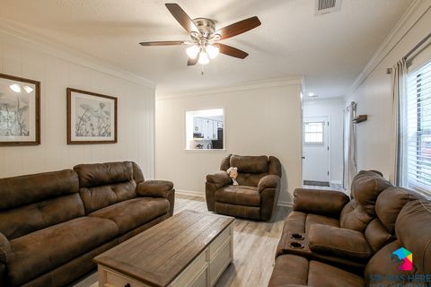 Living Room with reclining couches | Celling Fan