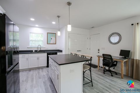 Kitchen with Desk in the background