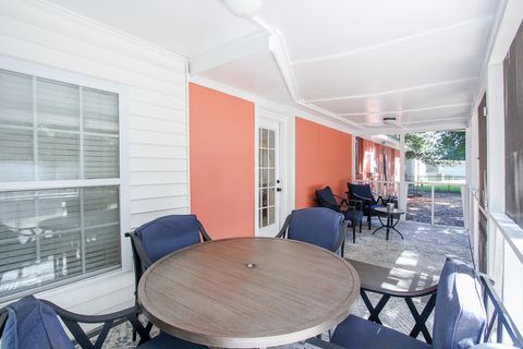 Screened porch with seating