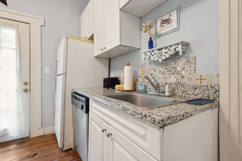 The kitchen is fully equipped with modern appliances, ample counter space, and all the essentials you need to prepare meals. It''s a bright and functional space, perfect for cooking and enjoying time with family or friends.