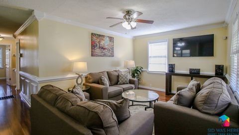 Living room with a 50" HDTV with Amazon Prime Video, Apple TV, Chromecast, Disney+, Fire TV, HBO Max, Hulu, Netflix