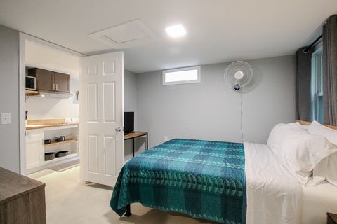 1 queen bed in the only bedroom with TV