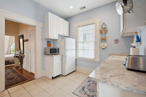 The kitchen is fully equipped with modern appliances, ample counter space, and all the essentials you need to prepare meals. It''s a bright and functional space, perfect for cooking and enjoying time with family or friends.