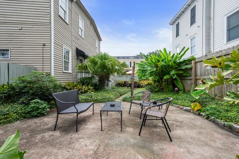 The back patio offers a peaceful outdoor retreat and complete with comfortable seating. Perfect for relaxing, dining, or entertaining in the fresh air.