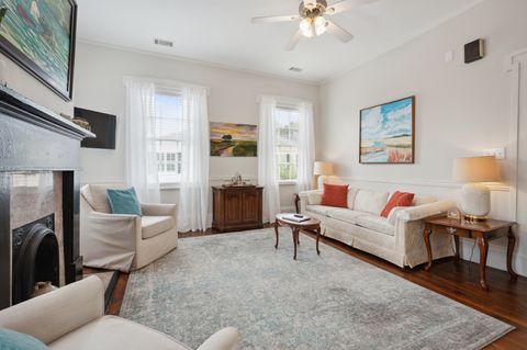 The living room is spacious and inviting, featuring comfortable seating, a flat-screen TV, and plenty of natural light. It''s the perfect spot to relax and unwind after a day of exploring.