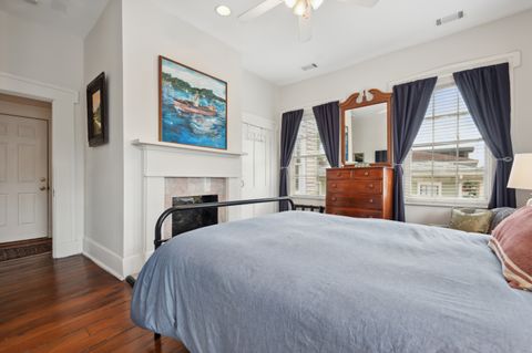 Bedroom 1 features a comfortable queen-sized bed with soft linens, creating a cozy and relaxing atmosphere for your stay. Perfect for a restful night''s sleep.