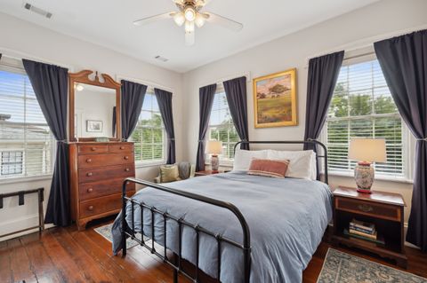 Bedroom 1 features a comfortable queen-sized bed with soft linens, creating a cozy and relaxing atmosphere for your stay. Perfect for a restful night''s sleep.