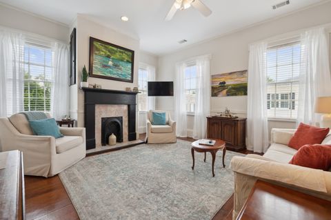 The living room is spacious and inviting, featuring comfortable seating, a flat-screen TV, and plenty of natural light. It''s the perfect spot to relax and unwind after a day of exploring.