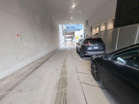 Follow driveway to underground public parking lot.