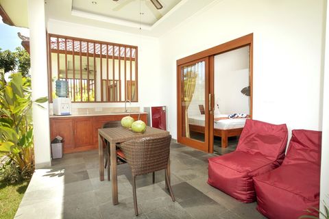 Kitchinette with basic utensils & dining table and bean bags. Dinning table can be used for work, if really necessary. But hey, you are on vacation! 