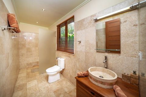 Classy marble bathroom is bright, with spacious walk-in shower, strong water pressure and hot water. Lot of space for your amenities.