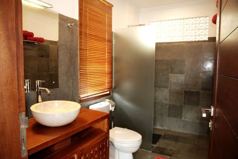 Our stylish bathrooms, you will gonna love it! Made of stone, so it is usually cooler. It has spacious shower and strong water pressure, including hot water. Big mirror and lot of space to store amenities.