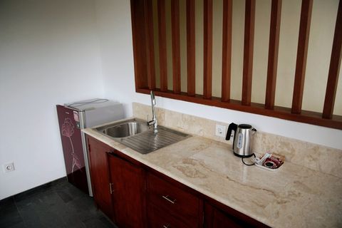 Kitchenette with all the necessary amenities. Coffee corner, fridge, boiling kettle, sink, basic  utensils. No stove tho! 