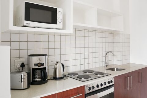 Fitted stove and microwave